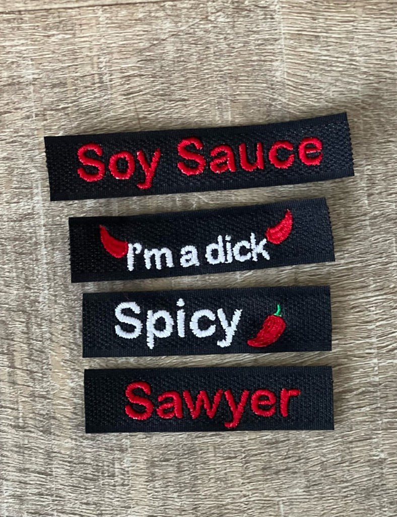 Custom embroidered tags with emoji